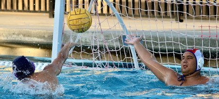 Lemoore's Drew Rhoads scores against Hanford in the first quarter.